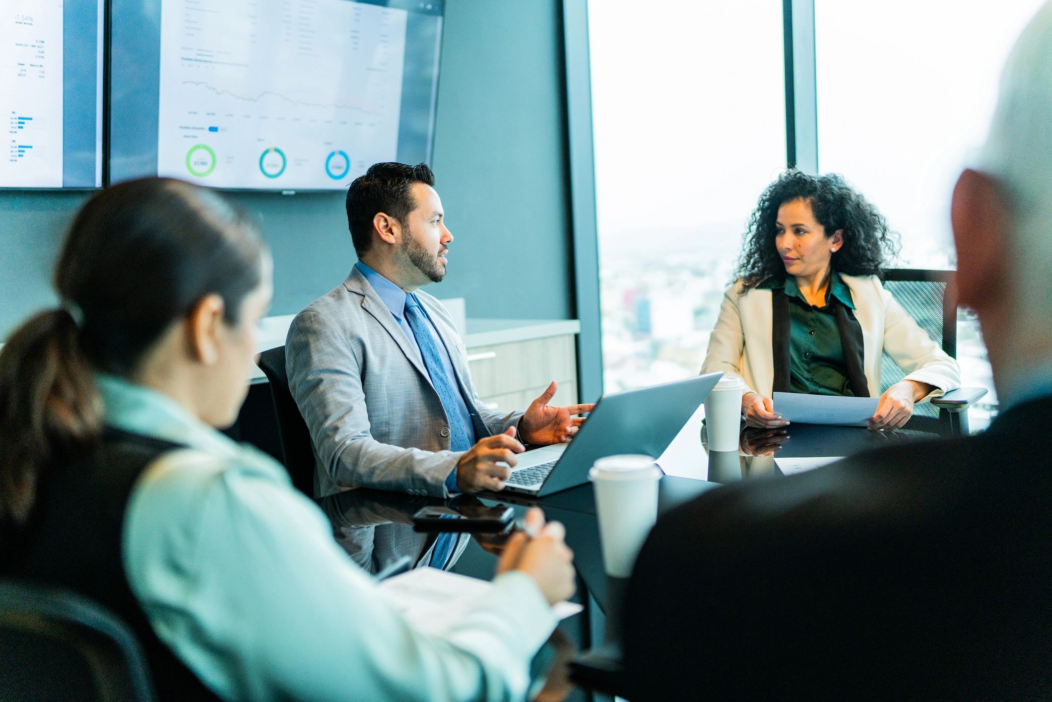 Consultants discussing strategy in a meeting